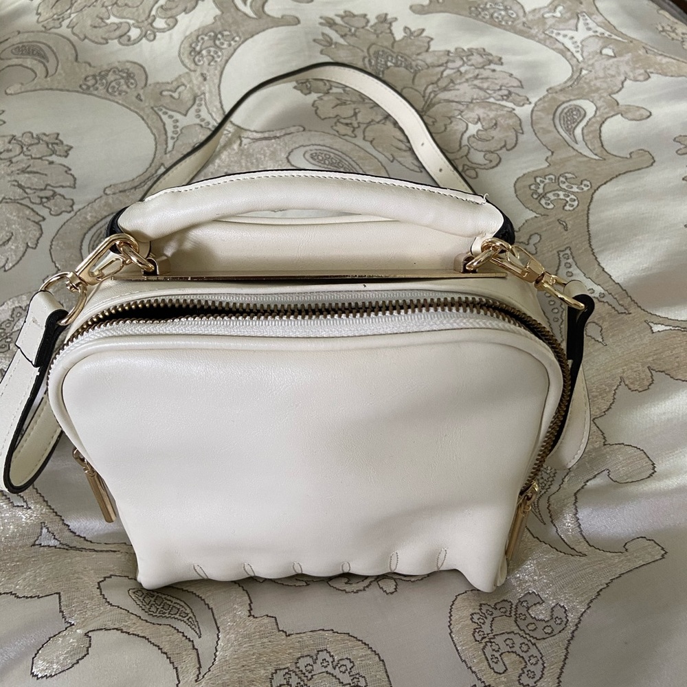 Chic Leather cream top handle and cross body bag